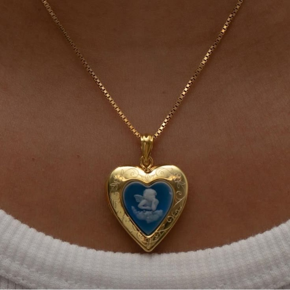 M Jewelers blue cherub heart locket necklace